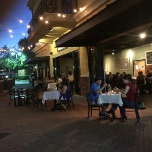 On cooler nights, the restaurant can open one entire wall and offer seating on the onto a bricked outdoor patio.