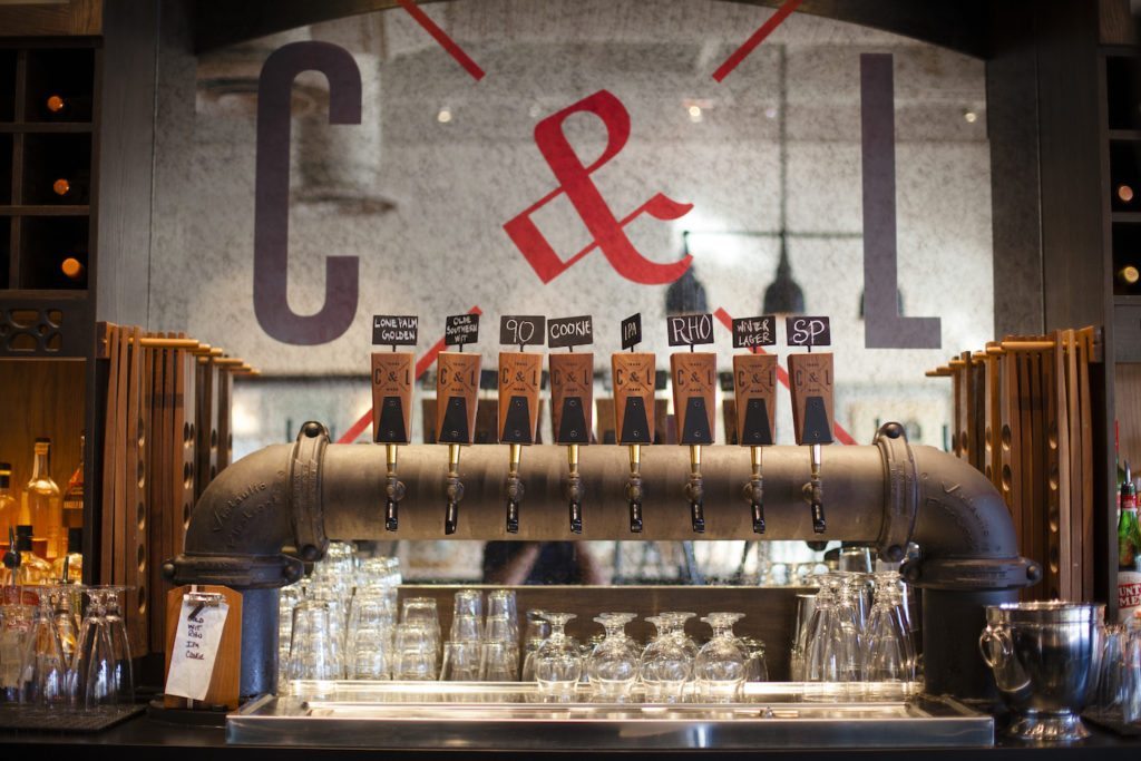 Brewed on-site craft beers on tap at Cask & Larder