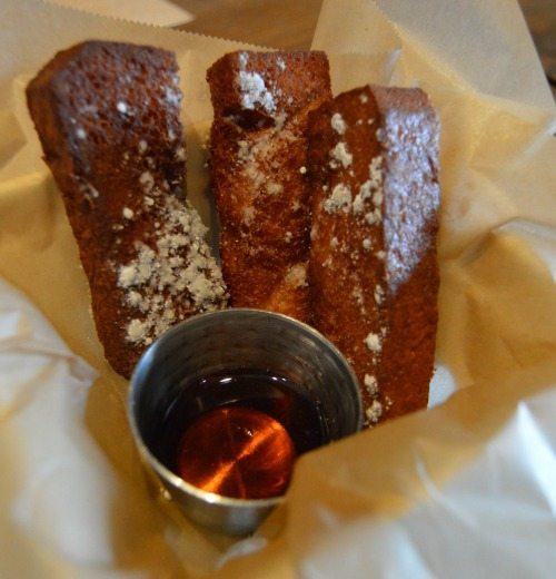 SLATE’s brunch menu also offers a variety of side dishes that could be just as filling, one of them being their French toast sticks. The sticks are made with brioche and coated with an in-house custard. Once made, they are sprinkled confectioners’ sugar and served with a side of maple syrup from Vermont, which is sinfully sweet.