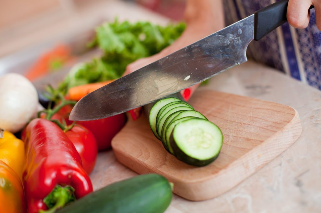 woman-chopping-vegetables-in-1