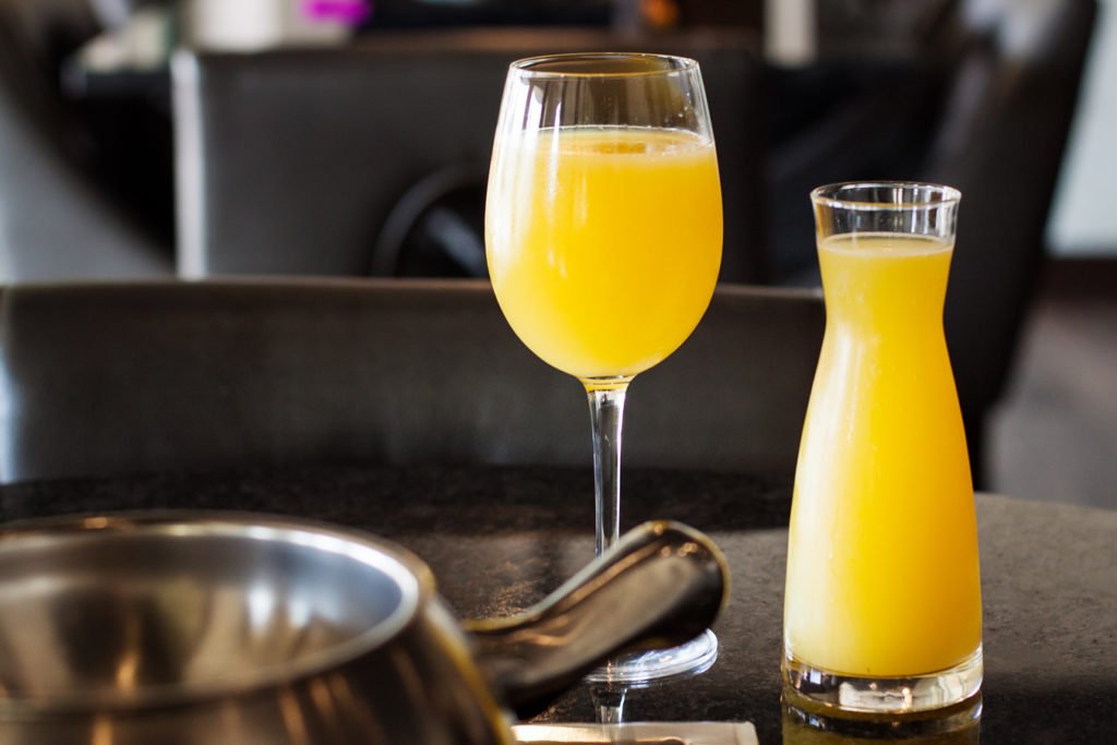 Bottomless mimosas during Sunday brunch at The Melting Pot Orlando