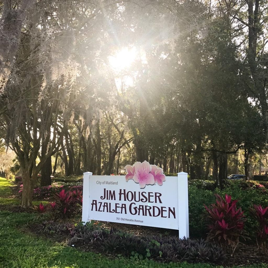 Jim Houser Azalea Garden Maitland sign with sun and oak trees