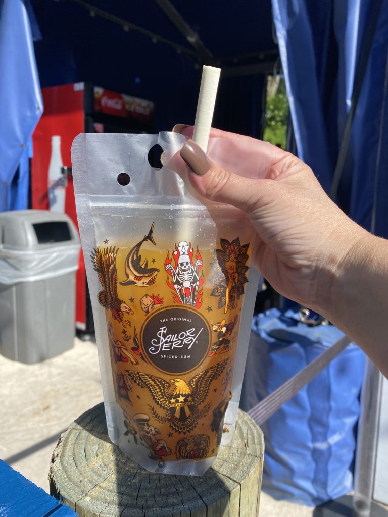 Manta Coaster Cocktail - SeaWorld Seven Seas Food Festival - served in a clear juice pouch with classic tattoo style art
