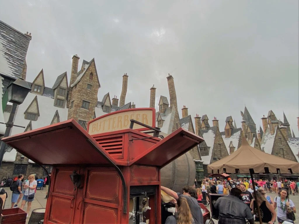 Butterbeer Cart and Crowds at Hogsmeade Village at Universal Orlando on a cloudy day