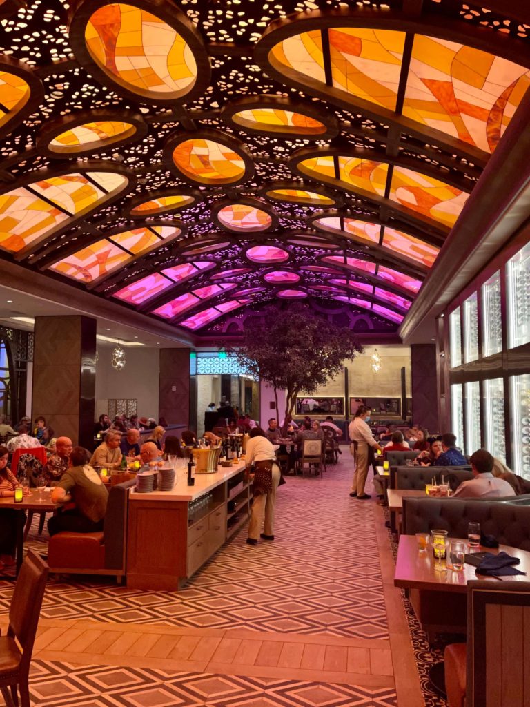 dining room and ceiling at toledo features a colorful vaulted ceiling