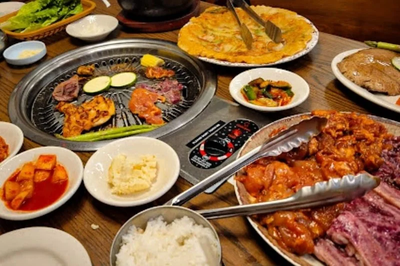 restaurant table with korean bbq grill