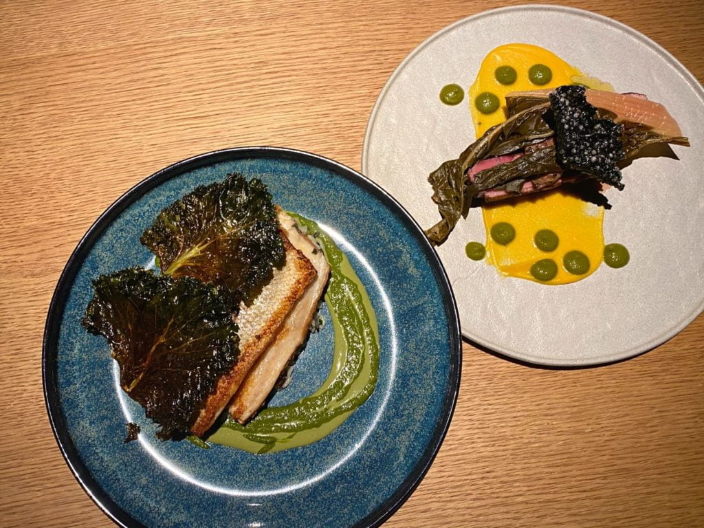 Branzino and Duck Breast Entrees at BACAN Restaurant