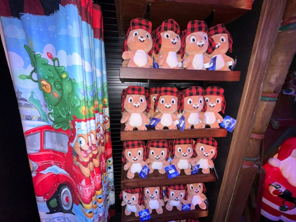 Earl the Squirrel Merchandise inside the tribute store includes cute plush dolls and a soft, colorful blanket