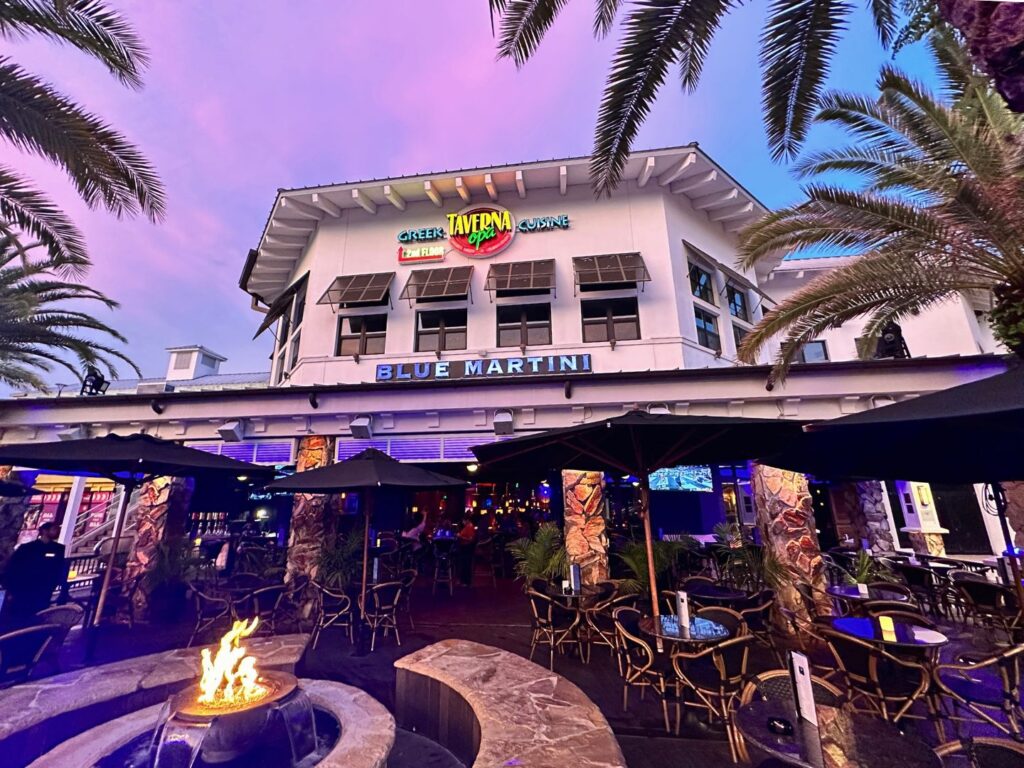 Outdoor Dining at Blue Martini Pointe Orlando with a small firepit