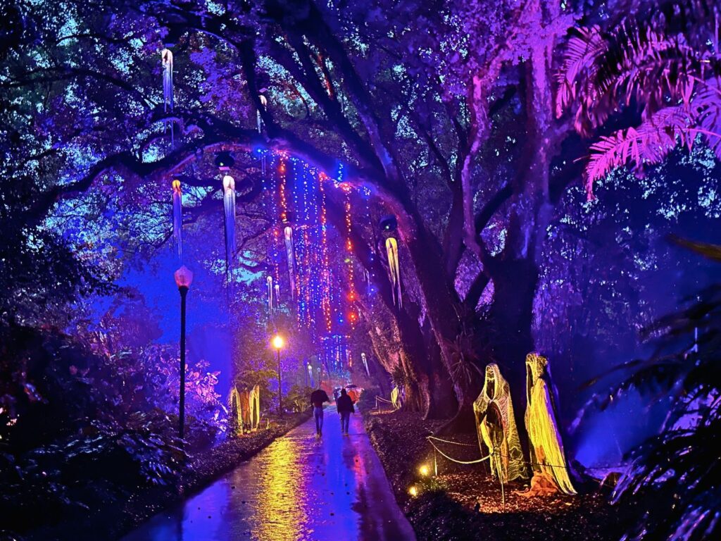 Apparition Alley at Haunting Nights Leu Gardens with purple lighting and haunted decorations