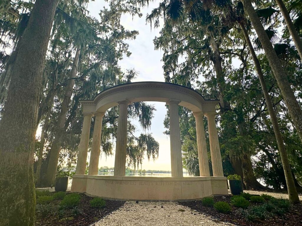 Kraft Azalea Gardens exedra overlooking lake and flanked by cypress trees