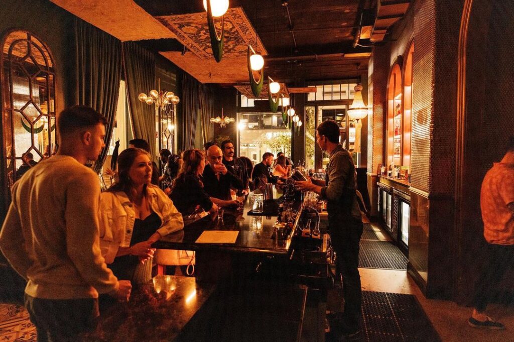 dimly lit bar with sophisticated decor Bellhop Orlando 