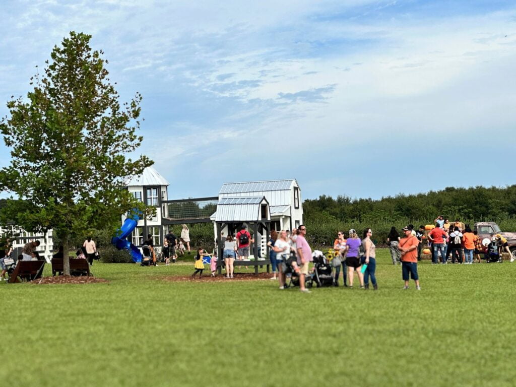 Families gather at playground at Amber Brooke Farms Eustis Near Orlando 