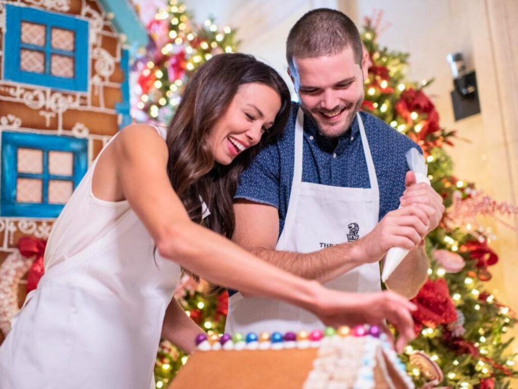 Couple Making a Gingerbread House during Gingerbread School at The Ritz-Carlton Orlando Grande Lakes