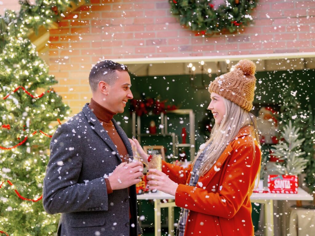 Image of Couple Toasting in the snow at Grande Lakes Orlando