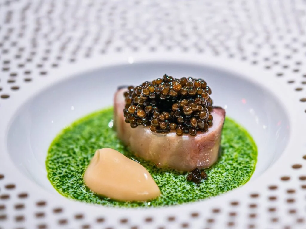 Image of Dry-aged, grilled wild Japanese kinki, broken buttermilk sauce, onion soubise, Omo Reserve caviar at Ômo by Jônt