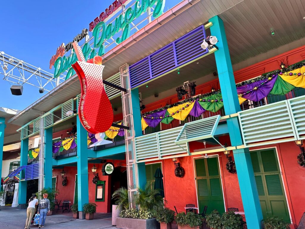 Pat O' Briens Universal CityWalk Mardi Gras Decorations hang at the restaurant's facade and entrance