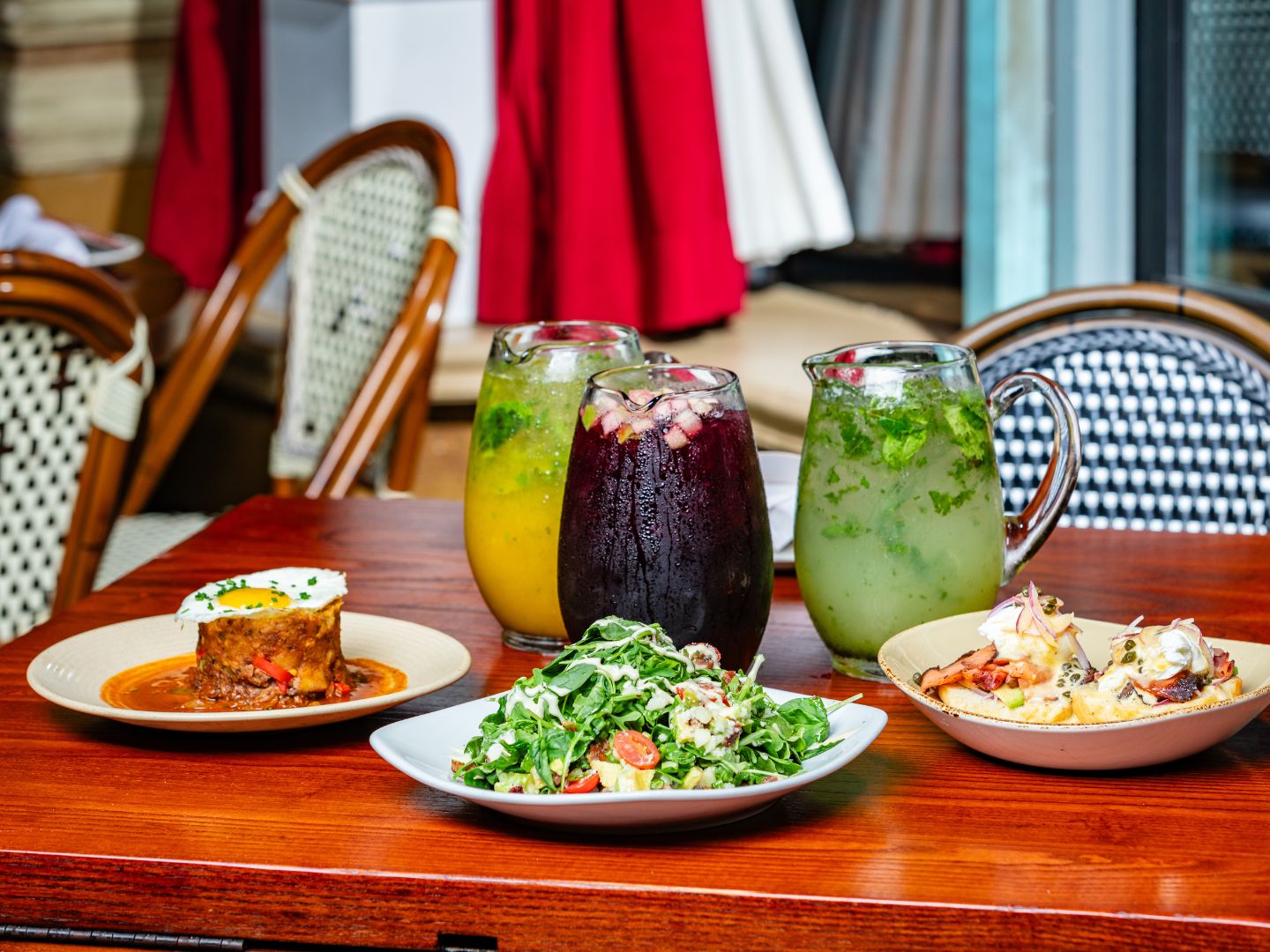 Brunch dishes and pitchers at Cuba Libre Pointe Orlando