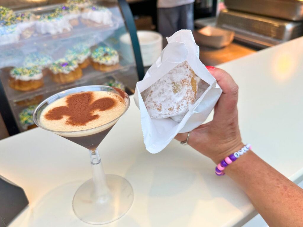 Espresso Martini with special garnish and Beignets in a bag at Universal Mardi Gras 2024 