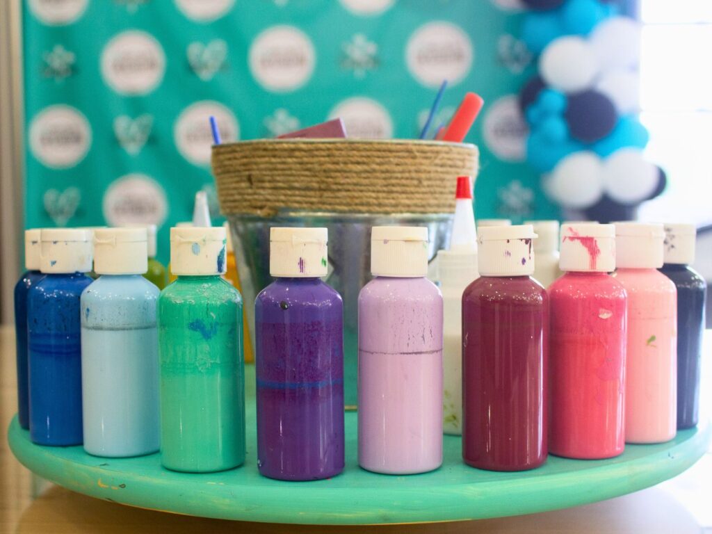 multiple paint bottles for crafts at Once Upon a Creation Art Studio Clermont 