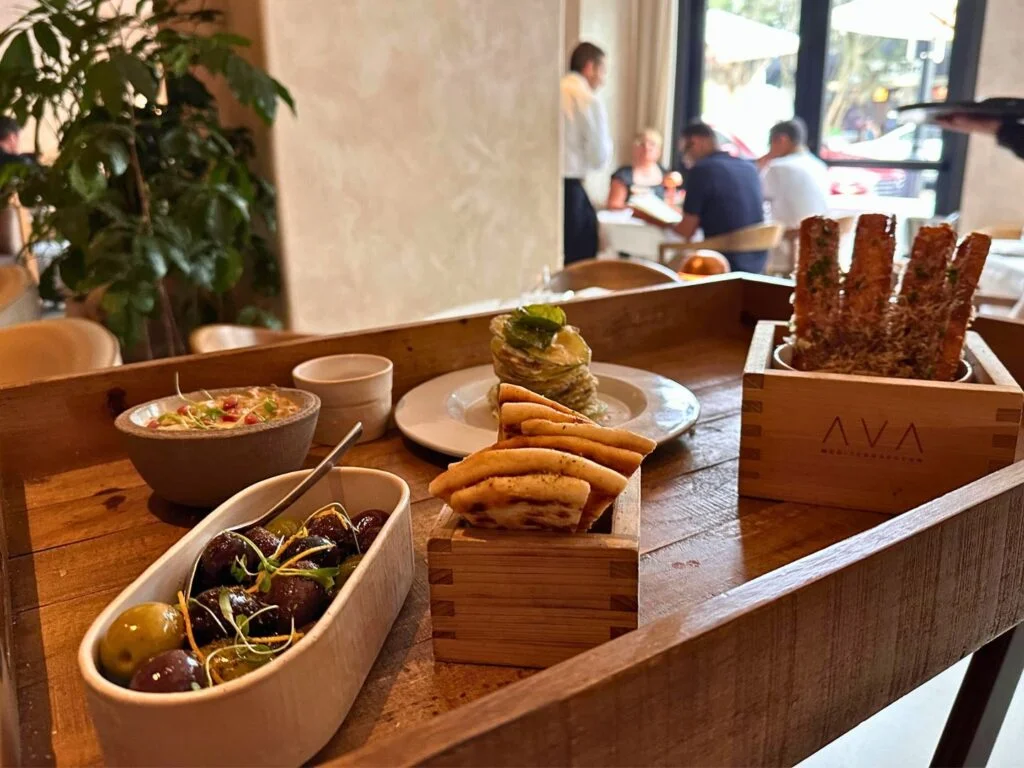 Golden Hour bites at AVA MediterrAegean served on a wooden tray