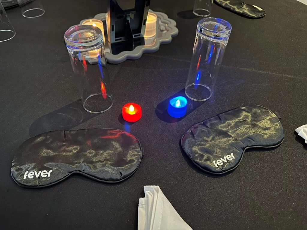 Blindfolds and Colored Lights on Table Setting for Dining in the Dark Orlando at Melia Celebration