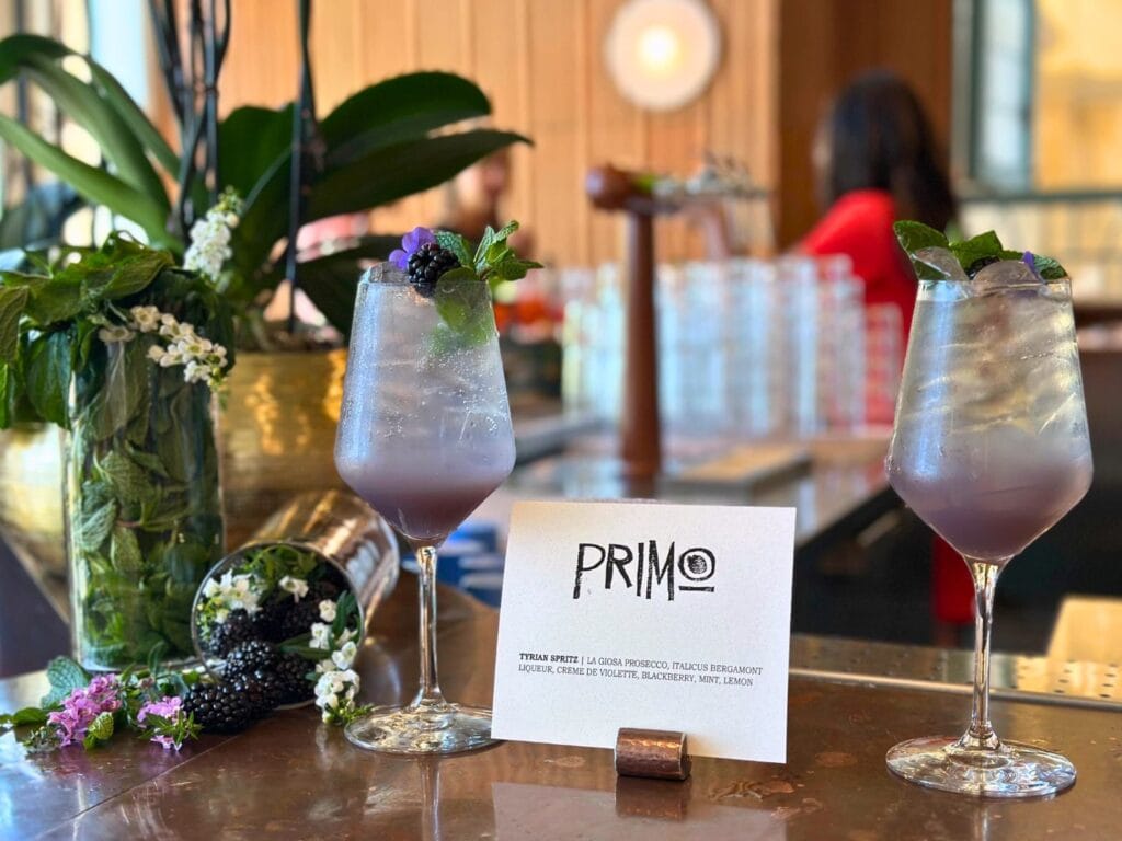 purple and mint drink Tyrian Spritz featured in Happy Hour at Primo JW Marriott Grande Lakes - image by Dani Meyering