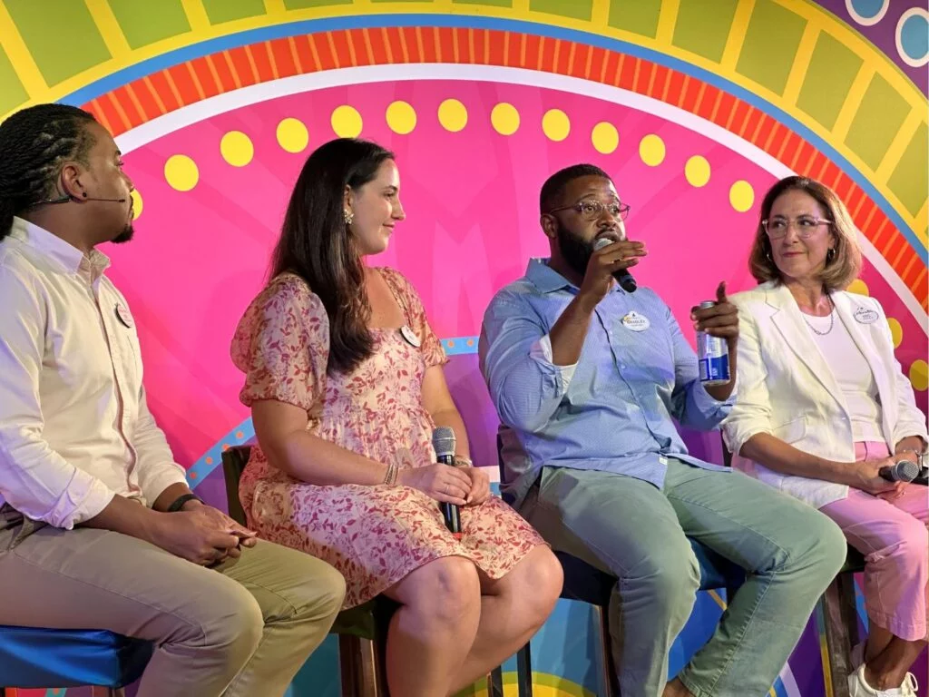 From left to right Joey Gaskins Jr, Melanie Parham Perez, Bradley Watson, Kristine Bunnell speak at a Disney Cruise Line panel - image by Dani Meyering