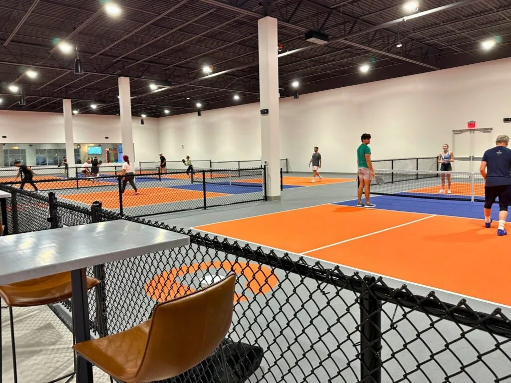 Couples Play Indoor Pickleball at Crush Yard Orlando Kissimmee - image by Dani Meyering