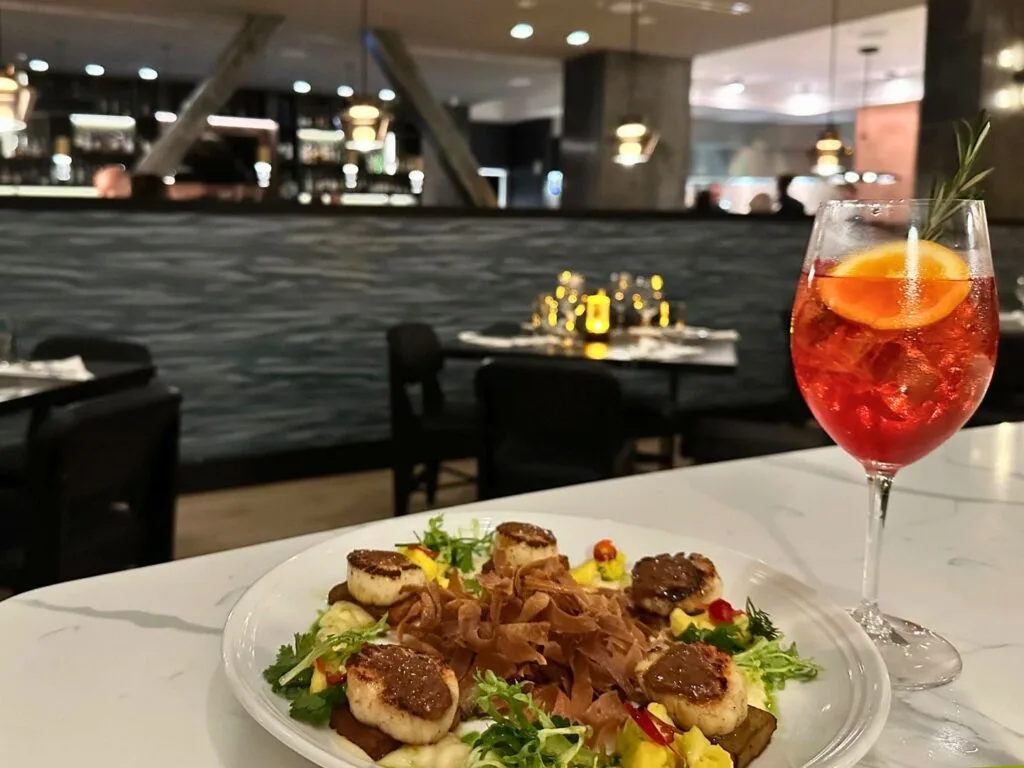 Scallops and Specialty Drink at Cast & Crew Daytona Beach