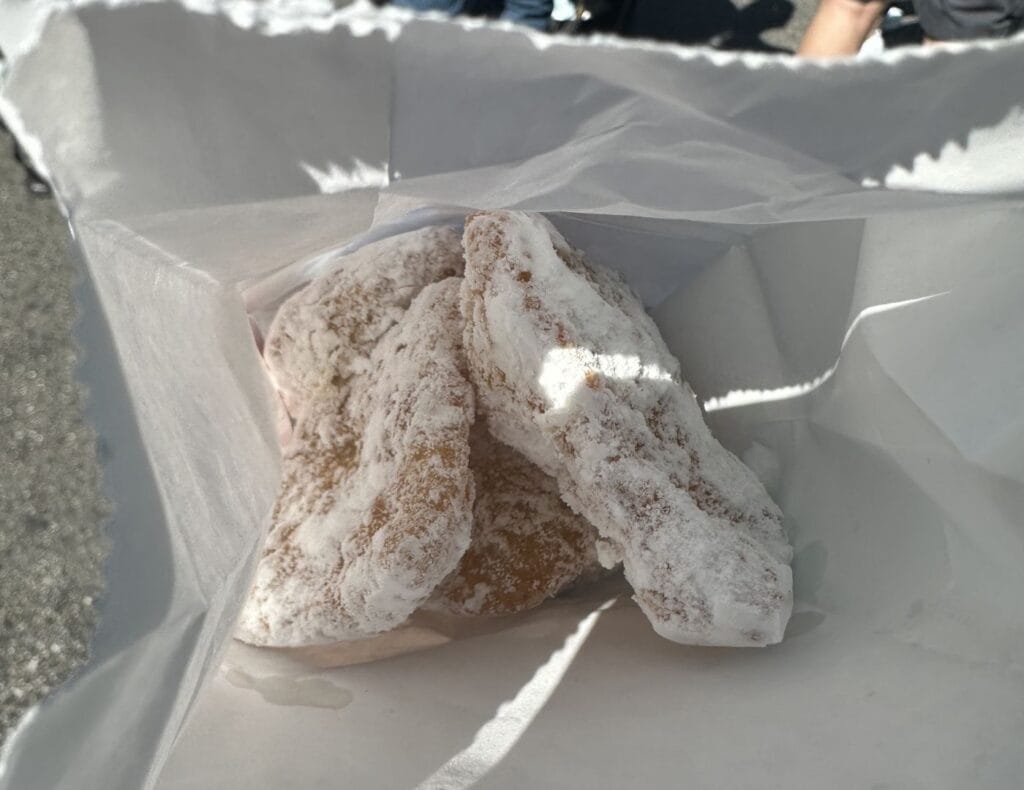 2026 Universal Mardi Gras Beignets with powdered sugar