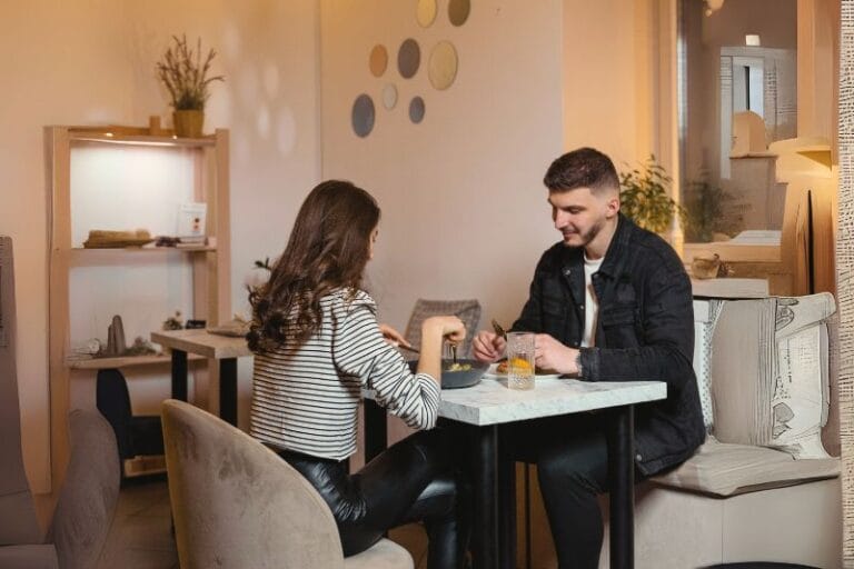 a couple indoors at a cafe for Spring Date Ideas Orlando