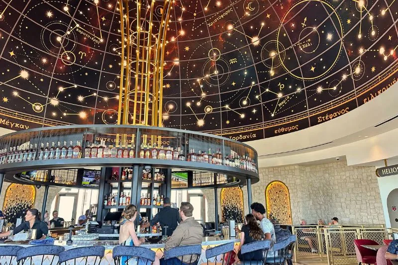 Dazzling decor and guests at 360 bar of Bar Helios - image by Dani Meyering center view