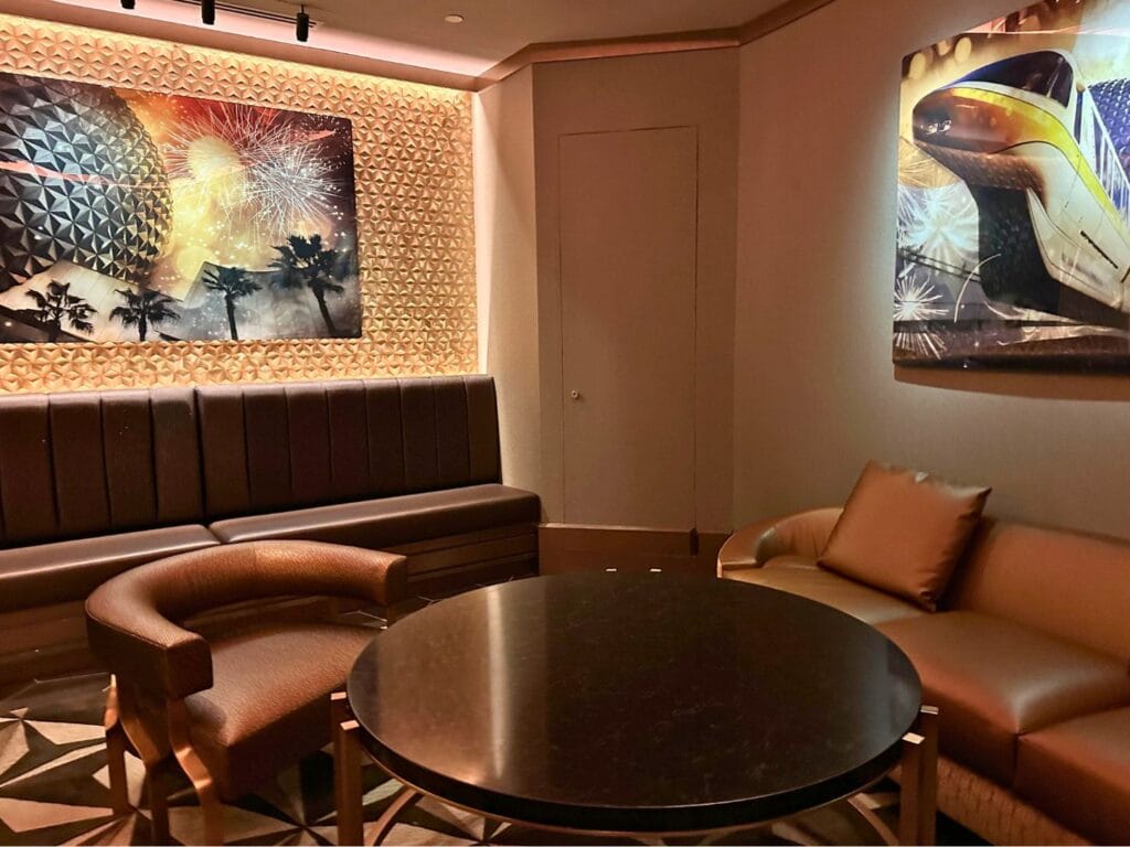 GEO-82 Adults Only Lounge at EPCOT waiting area with Epcot art - image by Dani Meyering