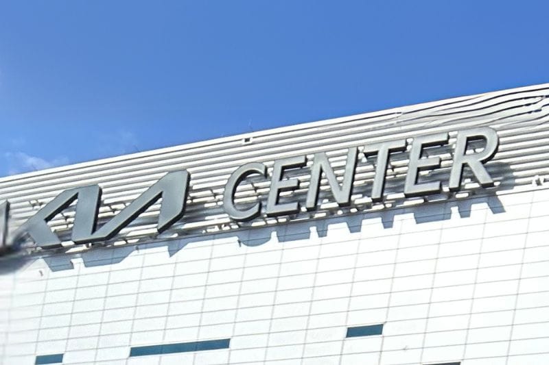 Kia Center exterior edge of building against a blue sky