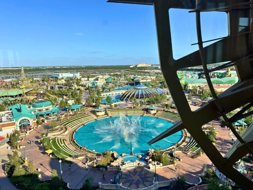 View of Celestial Park Fountain Show and Epic Universe from up above at Bar Helios during the day - image by Dani Meyering