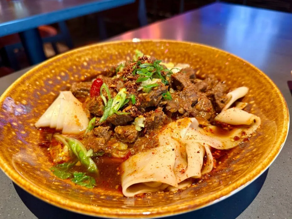 Beef Xi'an Noodles at Blue Dragon Epic Universe - image by Jodi Caballero