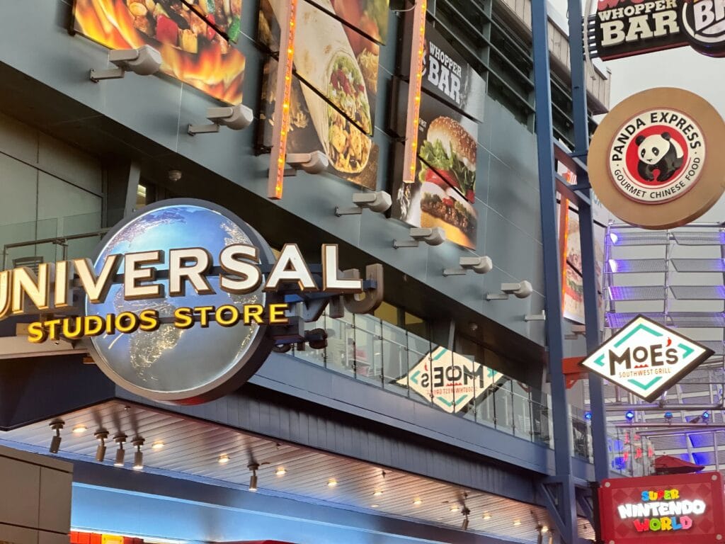 Super Nintendo World store sign and quick eatery signs at Universal CityWalk - image by Dani Meyering