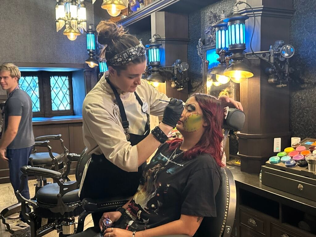 young woman getting Darkmoor Monster Makeup Experience - image by Terri Peters