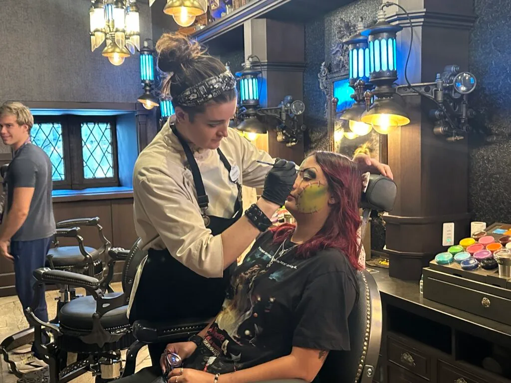 young woman getting Darkmoor Monster Makeup Experience - image by Terri Peters