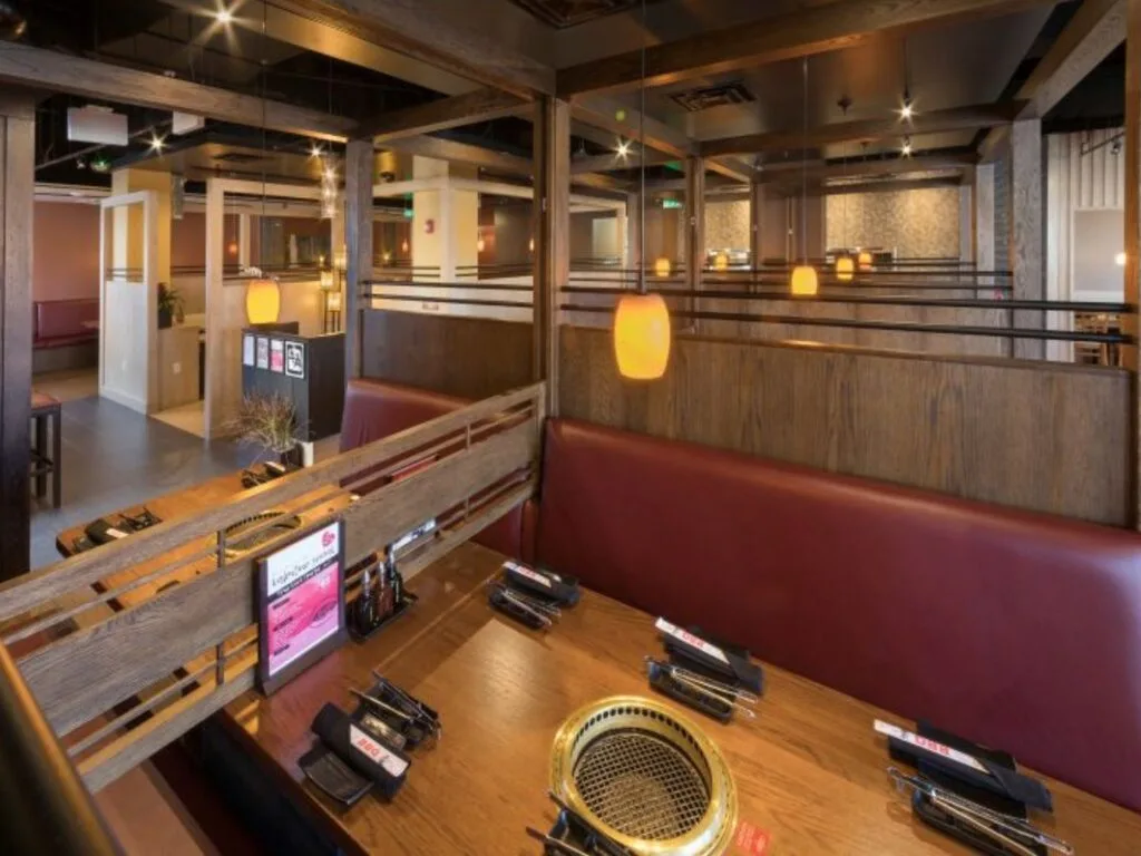 Booth and table with grill at Gyu-Kaku Orlando date night