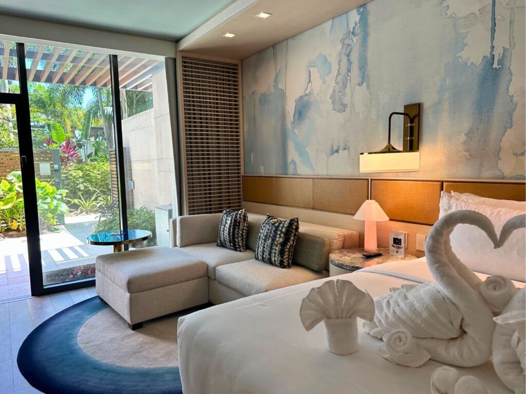 Conrad Orlando Wellness Room bed and patio - image by Dani Meyering compress