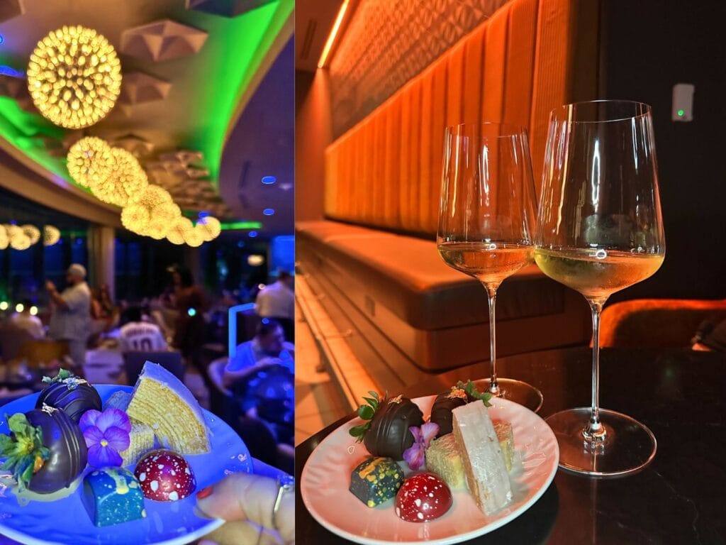 GEO-82 Adults Only Lounge at EPCOT dining area with view of EPCOT Fireworks experience dessert samples on table - image by Dani Meyering compress