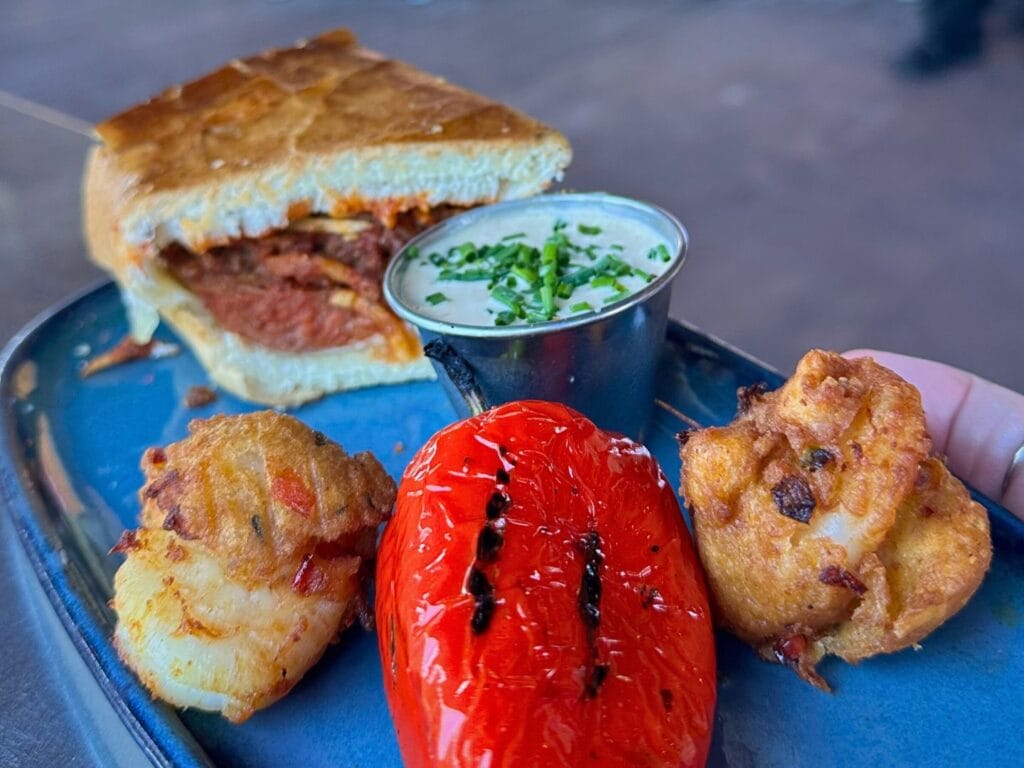 White Shrimp Fritters and Frita Cubana Dog Flavors of Florida Disney Springs - image by Dani Meyering