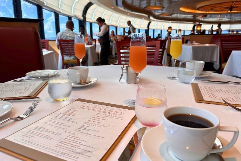 Coffee beverages and menu on table Palo Brunch Disney Magic - image by Dani Meyering