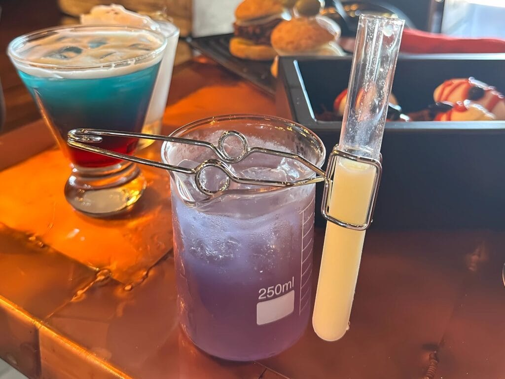 Scarab Beetle Essence Cauldron Cooler drinks at Halloween Hangar Bar Disney Springs - image by Dani Meyering