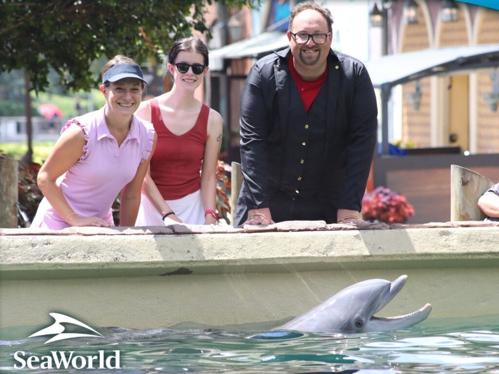Bree the dolphin posing for a group photo