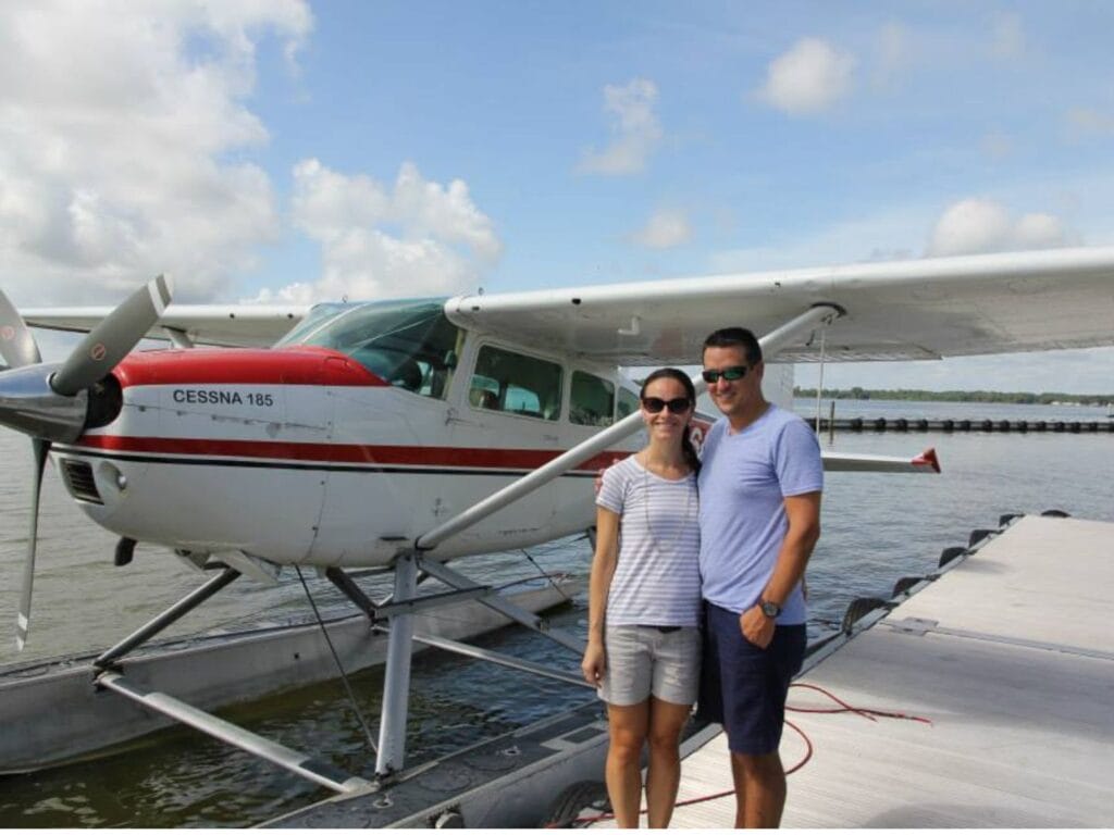 Couple next to Seaplane in Tavares