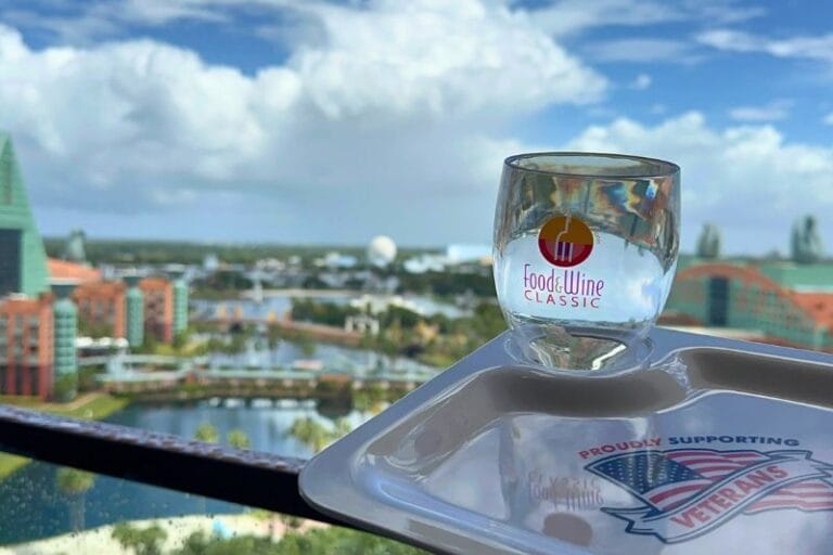 Aerial View with Swan Dolphin Food & Wine Classic tray and wine glass - image by Dani Meyering comp