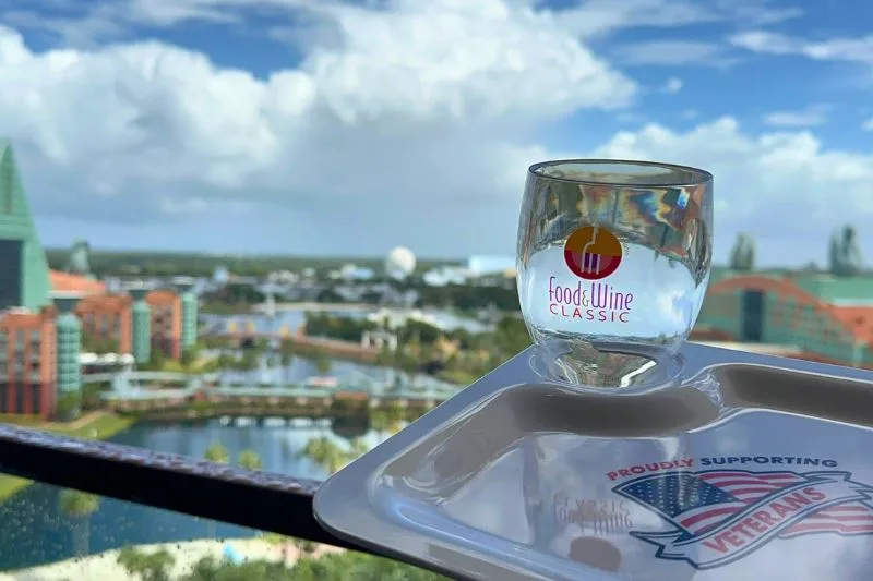 Aerial View with Swan Dolphin Food & Wine Classic tray and wine glass - image by Dani Meyering comp